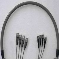 Indoor Armored 4 Fiber FC/UPC to ST/UPC Patch Cord 50/125 Multimode